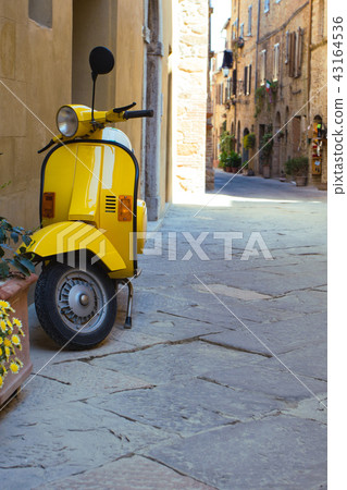 scooter at the empty street scooter at the empty street 43164536