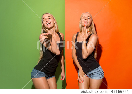 Portrait of attractive cute girls with bright makeup with kiss Portrait of attractive cute girls with bright makeup with kiss 43166755