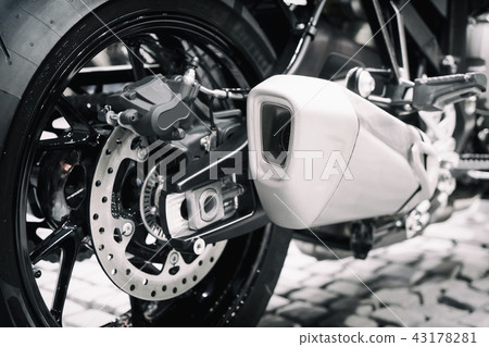 Close up shot of new motorcycle exhaust pipes. Close up shot of new motorcycle exhaust pipes. 43178281