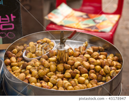 A street selling at a street vendor A street selling at a street vendor 43178947
