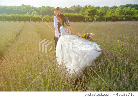 Bride and groom after wedding ceremony Bride and groom after wedding ceremony 43182713