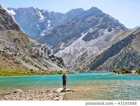 Hiker with backpack near Kulikalon lake 43185898