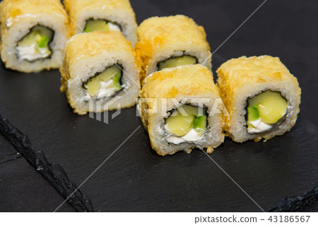 Hot Sushi roll with salmon. Japanese food. 43186567