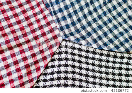 Three wool scarfs. The keffiyeh is a black scarf 43186772