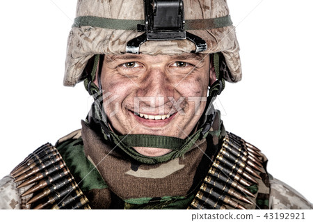 Happy smiling commando soldier in combat helmet Happy smiling commando soldier in combat helmet 43192921