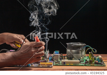 Computer motherboard repair by soldering Computer motherboard repair by soldering 43194325