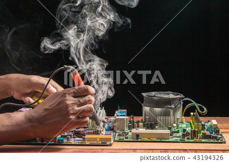 Computer motherboard repair by soldering Computer motherboard repair by soldering 43194326