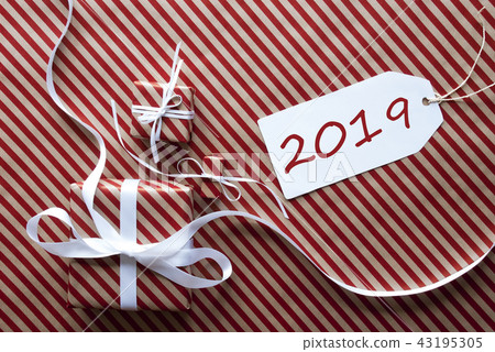 Two Gifts On Wrapping Paper With Label, Text 2019 Two Gifts On Wrapping Paper With Label, Text 2019 43195305
