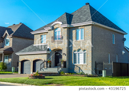Luxury house in Montreal, Canada against blue sky Luxury house in Montreal, Canada against blue sky 43196725