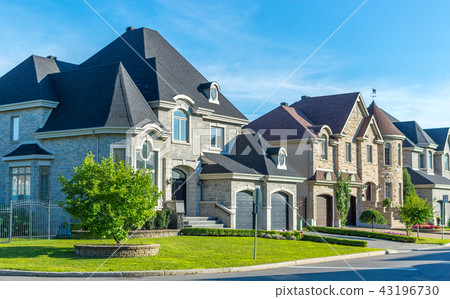 Luxury house in Montreal, Canada against blue sky Luxury house in Montreal, Canada against blue sky 43196730