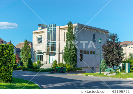Luxury house in Montreal, Canada against blue sky Luxury house in Montreal, Canada against blue sky 43196731
