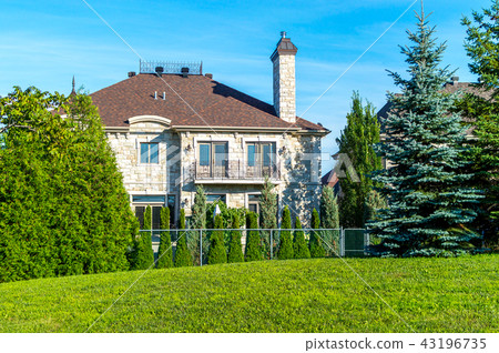 Luxury house in Montreal, Canada against blue sky Luxury house in Montreal, Canada against blue sky 43196735