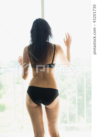 Portrait of sexy young woman model wearing bikini 43201730