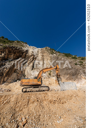 Excavator with Jackhammer - Marble Quarries Italy 43202810