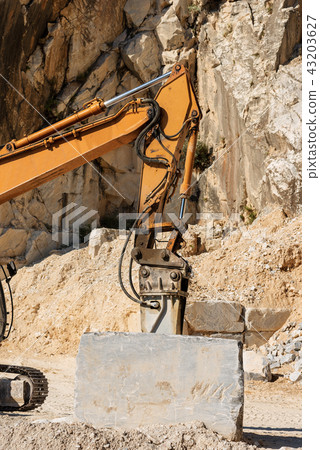 Excavator with Jackhammer - Marble Quarries Italy 43203627