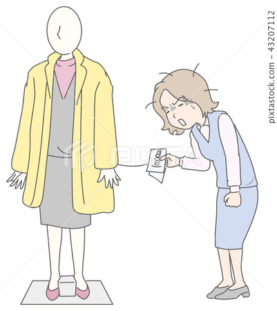 A woman surprised by looking at a price tag 43207112