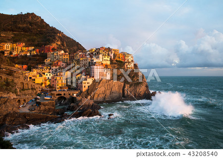 The village of Cinque Terre illuminated by the setting sun Manarola, Liguria, Italy The village of Cinque Terre illuminated by the setting sun Manarola, Liguria, Italy 43208540
