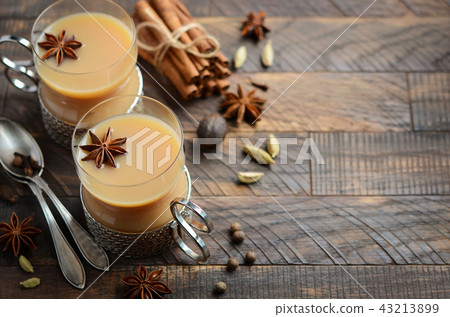 Indian masala chai tea. Spiced tea with milk. 43213899