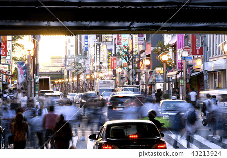 Tokyo cityscape in Japan Cityscape in front of Shin-Okubo Station (not shown in the photo, but Shin-Okubo Station entrance on the left side of the screen) · Evening view 43213924