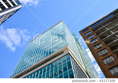 The glass skyscrapper reflecting the clouds in Ott The glass skyscrapper reflecting the clouds in Ott 43217209