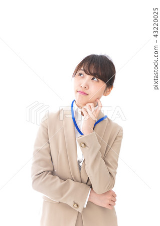 Young business woman thinking 43220025