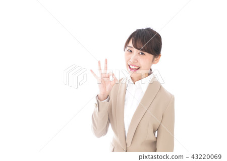 Young business woman doing ok sign 43220069