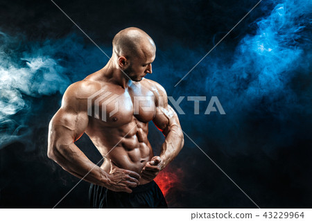 Strong bodybuilder man with perfect abs, shoulders,biceps, triceps, chest Strong bodybuilder man with perfect abs, shoulders,biceps, triceps, chest 43229964