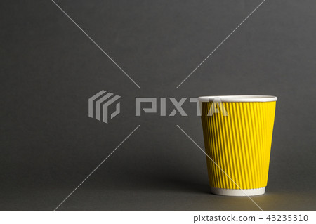 coffee in a yellow cup 43235310