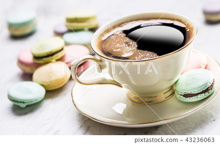 Cake from marzipan flowers macaroons and coffee. 43236063