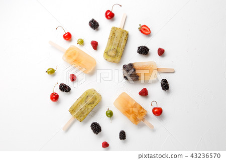 Image from above of frozen fruit ice, gooseberry, blackberry, cherry Image from above of frozen fruit ice, gooseberry, blackberry, cherry 43236570