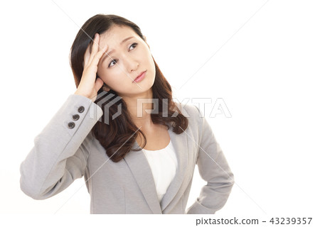 Suffering business woman Suffering business woman 43239357