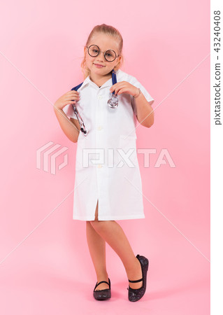 Little girl in doctor costume with stethoscope 43240408