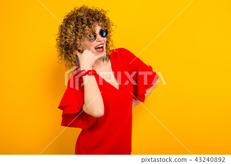 Attractive woman with short curly hair 43240892
