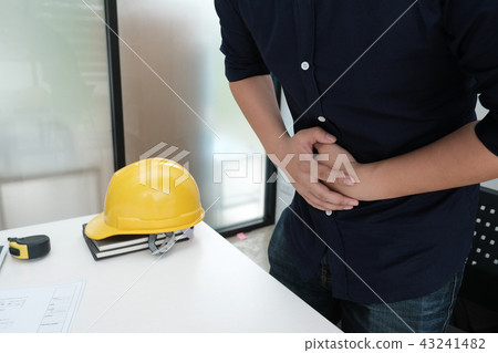 engineer suffering from stomach ulcer, stomachache. man with diarrhea & abdominal pain 43241482
