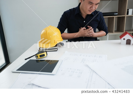 engineer suffering from chest pain. man have heart attack 43241483