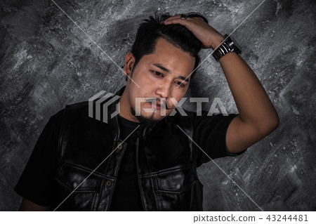 biker man in black leather jacket 43244481