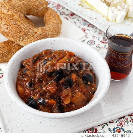 Eggplant and pepper stew with Feta, Turkish tea and simits 43246943