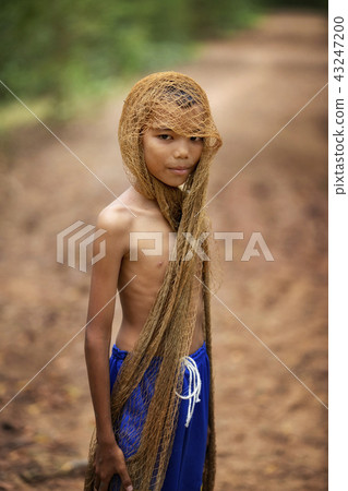 The image of a young man using a fishing net The image of a young man using a fishing net 43247200