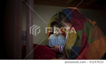 A girl staying with a friend staying 43247610