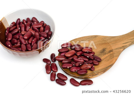 Red kidney bean in small bowl and wooden spoon Red kidney bean in small bowl and wooden spoon 43256620