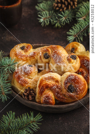 Traditional Swedish Christmas saffron buns  43258012