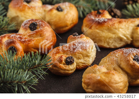 Traditional Swedish Christmas saffron buns Traditional Swedish Christmas saffron buns 43258017