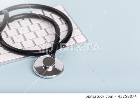 Black stethoscop and keyboard 43259874
