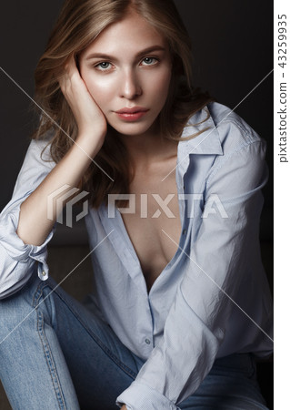 fashion model with long hair, perfect skin is posing in studio for glamour test photo shoot showing fashion model with long hair, perfect skin is posing in studio for glamour test photo shoot showing 43259935