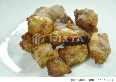 fried fermenting pork bone on white plate fried fermenting pork bone on white plate 43259985
