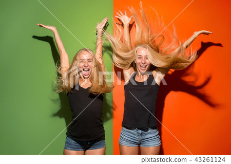 The happy business women standing and smiling 43261124