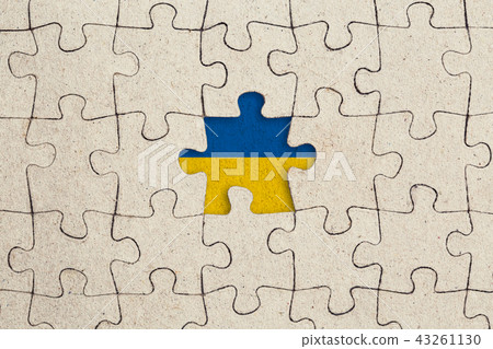 Missing jigsaw puzzle piece and ukranian flag Missing jigsaw puzzle piece and ukranian flag 43261130