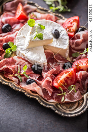 Cheese camambert from prosciutto tomatoes olives Cheese camambert from prosciutto tomatoes olives 43265058
