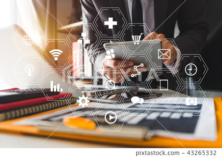 businessman or Designer using smart phone with l businessman or Designer using smart phone with l 43265332