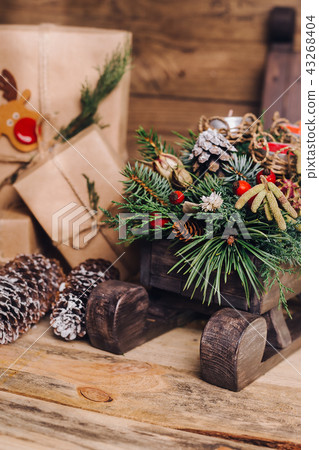 Christmas Gifts with Boxes on Wooden Background. Vintage Style. Closeup, selective focus. Toy, bear 43268404
